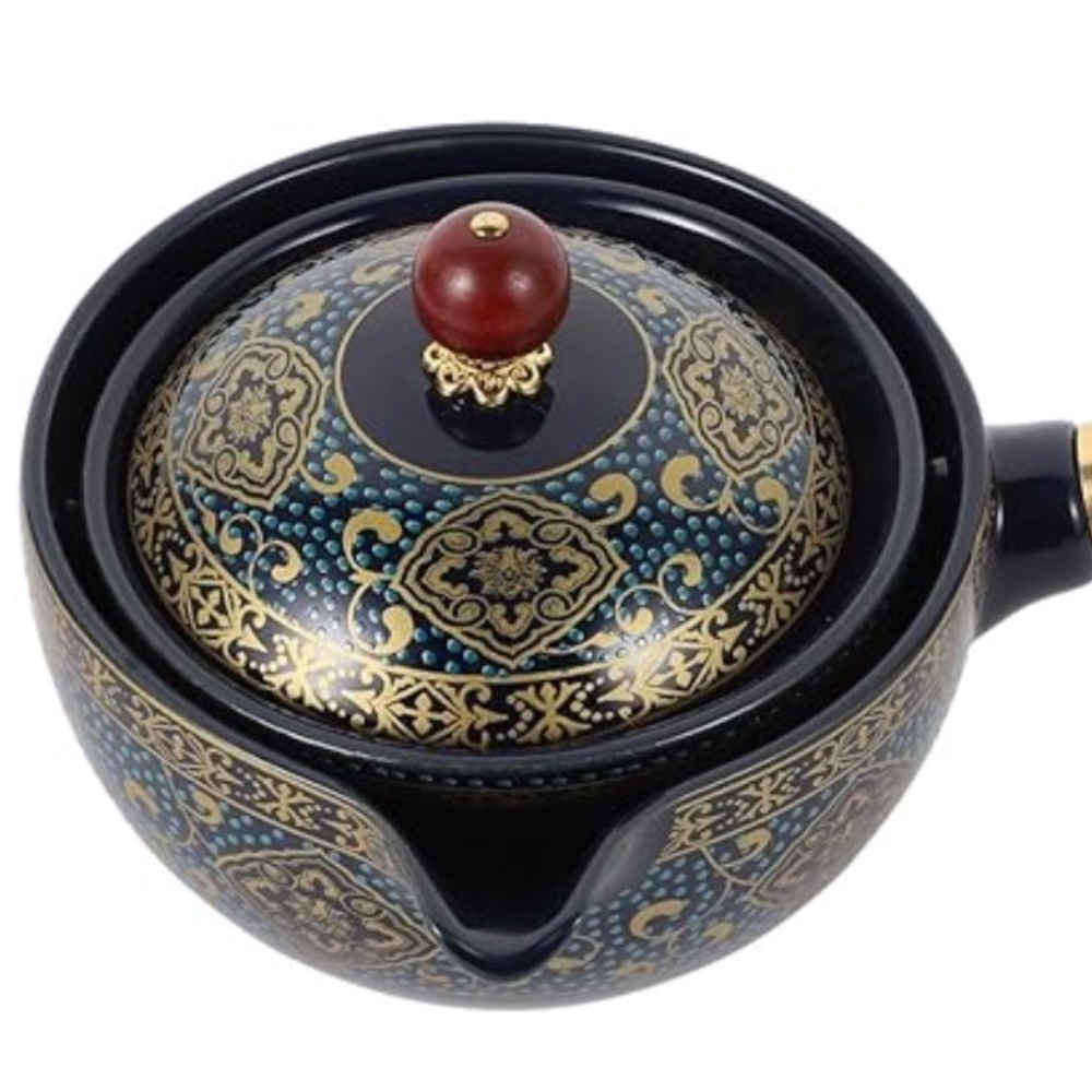 Intricate Black and Gold Teapot with Red Accent